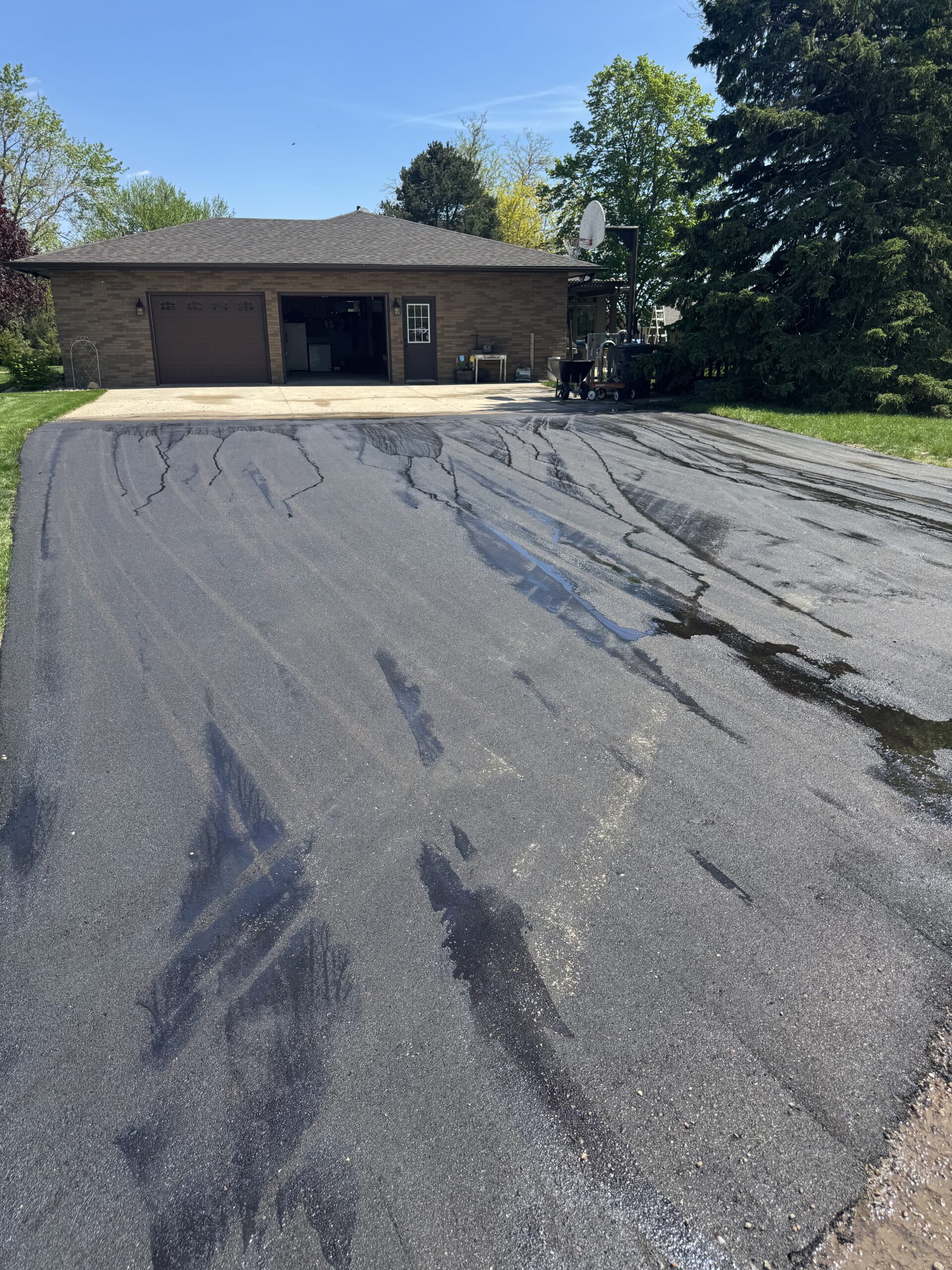 Sealcoating job coast to coast — Road Maintenance Asphalt Paving